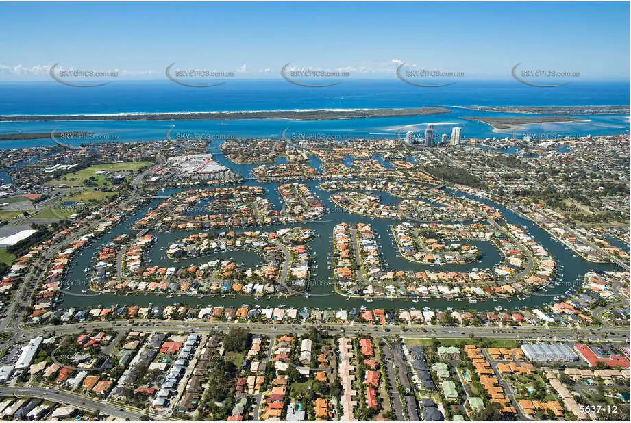 Aerial view of Runaway Bay on the Gold Coast, showcasing the suburb's distinctive canal estates, residential housing, marinas, and proximity to the coastline and Broadwater.