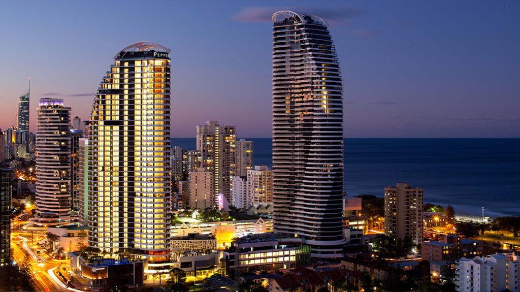 Night skyline of Broadbeach along the Gold Coast coastline—highlighting premium mobile physiotherapy services for locals and retirees across eastern beachside suburbs.