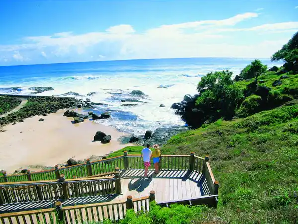 Mobile physiotherapist helping client near Snapper Rocks coastline